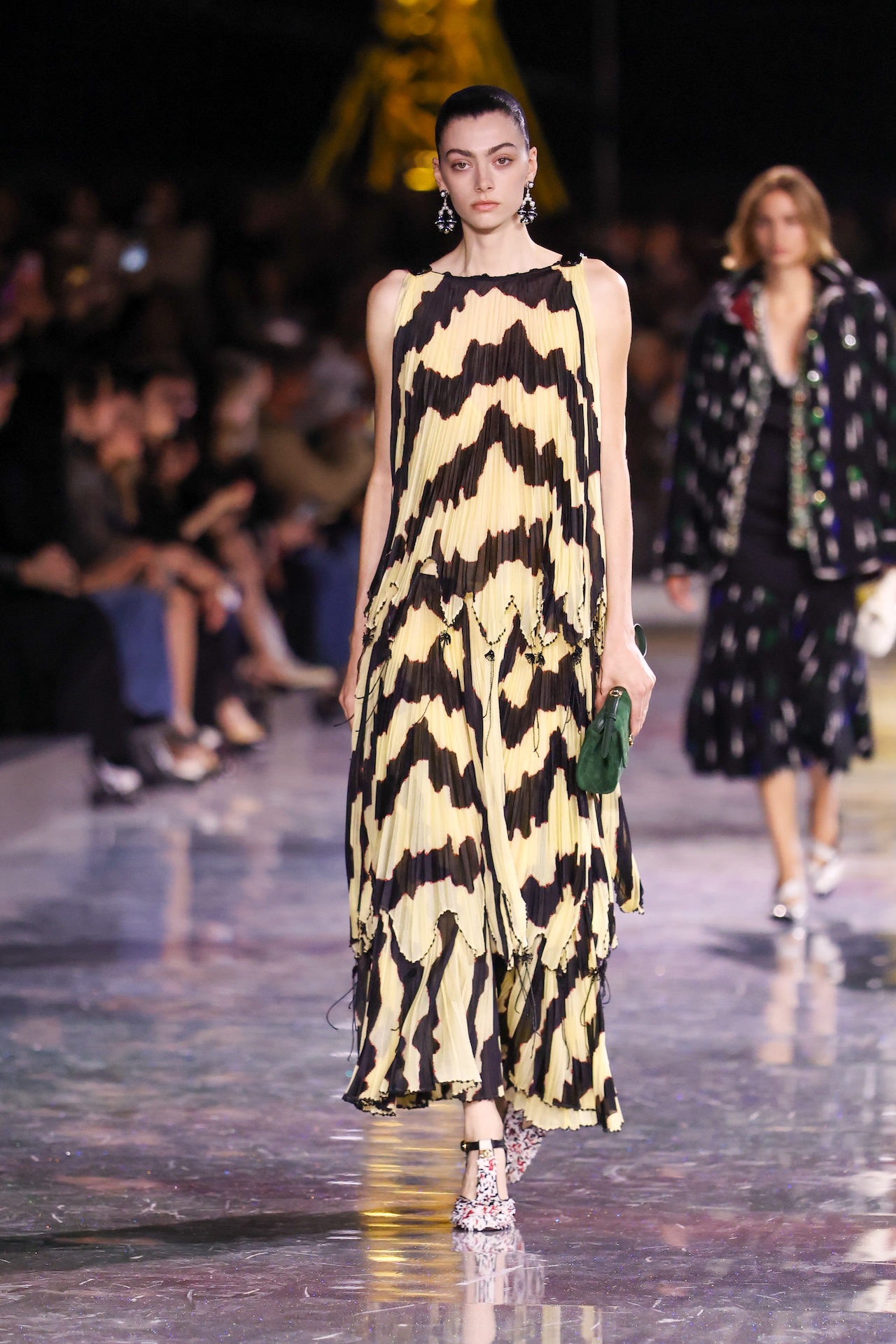 PARIS, FRANCE - MARCH 09: (EDITORIAL USE ONLY - For Non-Editorial use please seek approval from Fashion House) A model walks the runway during the Chanel Womenswear Fall/Winter 2026-2027 show as part of Paris Fashion Week on March 09, 2026 in Paris, France. (Photo by Stephane Cardinale - Corbis/Corbis via Getty Images)