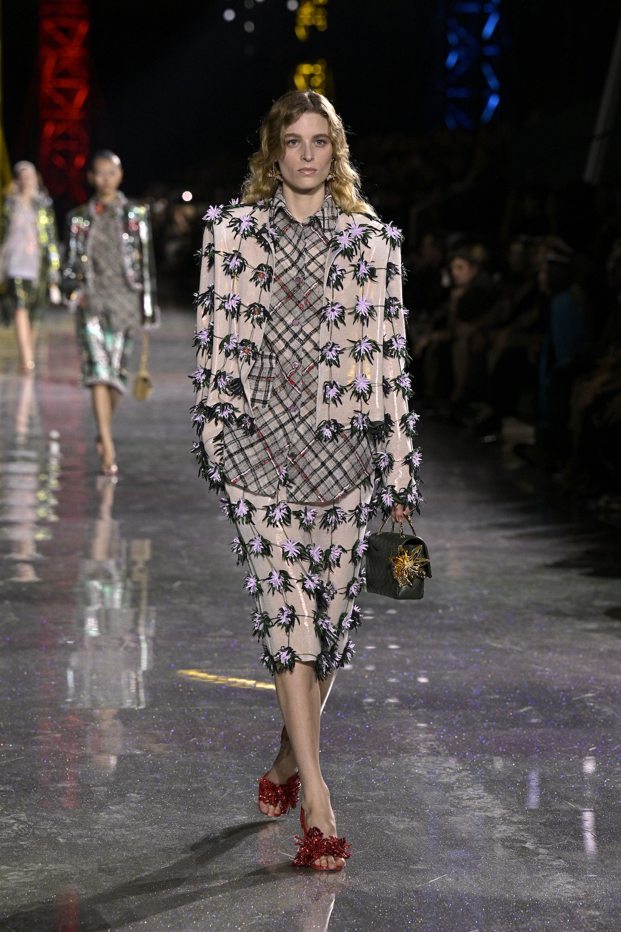 PARIS, FRANCE - MARCH 09: (EDITORIAL USE ONLY - For Non-Editorial use please seek approval from Fashion House) A model walks the runway during the Chanel Womenswear Fall/Winter 2026-2027 show as part of Paris Fashion Week on March 09, 2026 in Paris, France. (Photo by Kristy Sparow/Getty Images)