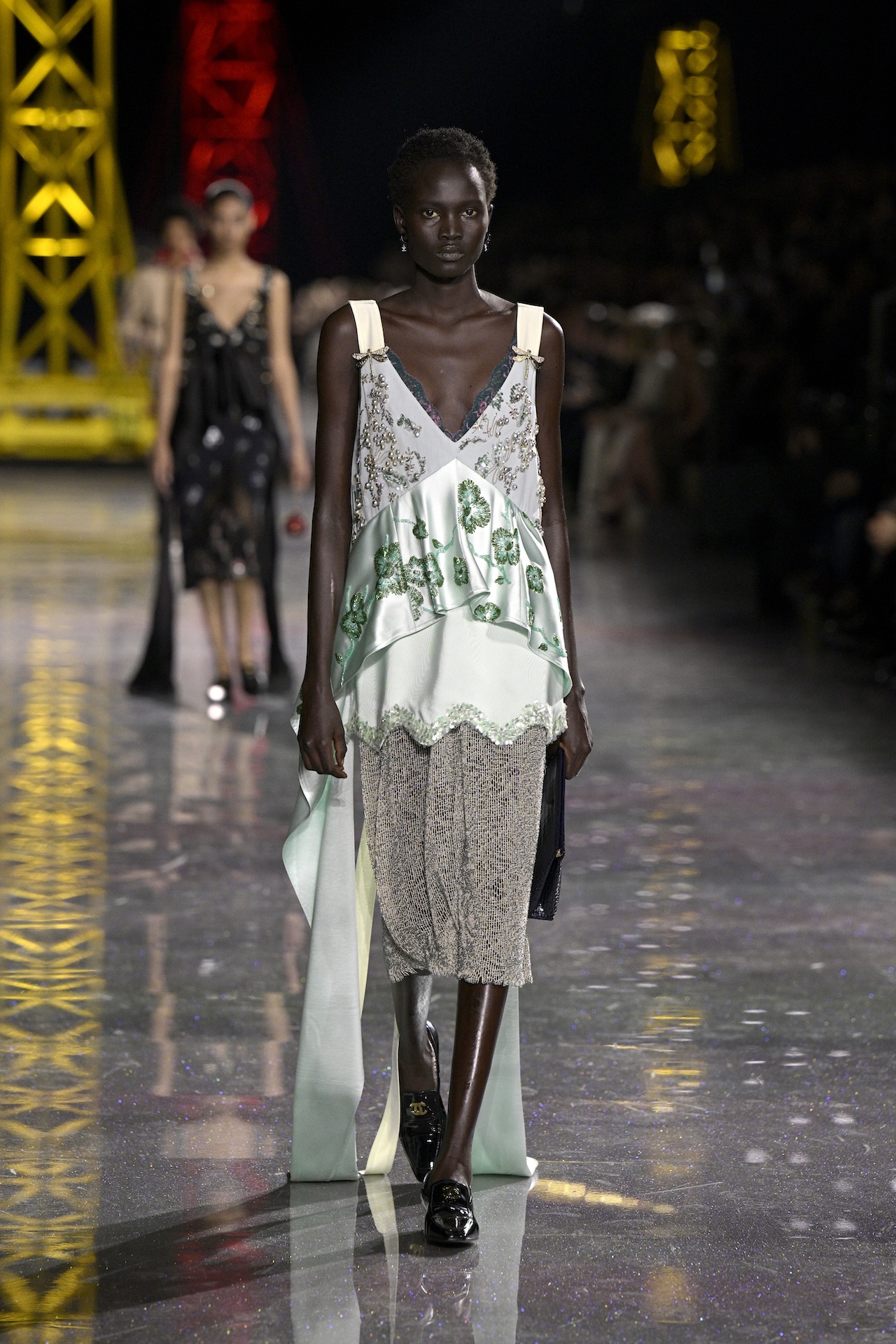 PARIS, FRANCE - MARCH 09: (EDITORIAL USE ONLY - For Non-Editorial use please seek approval from Fashion House) A model walks the runway during the Chanel Womenswear Fall/Winter 2026-2027 show as part of Paris Fashion Week on March 09, 2026 in Paris, France. (Photo by Kristy Sparow/Getty Images)