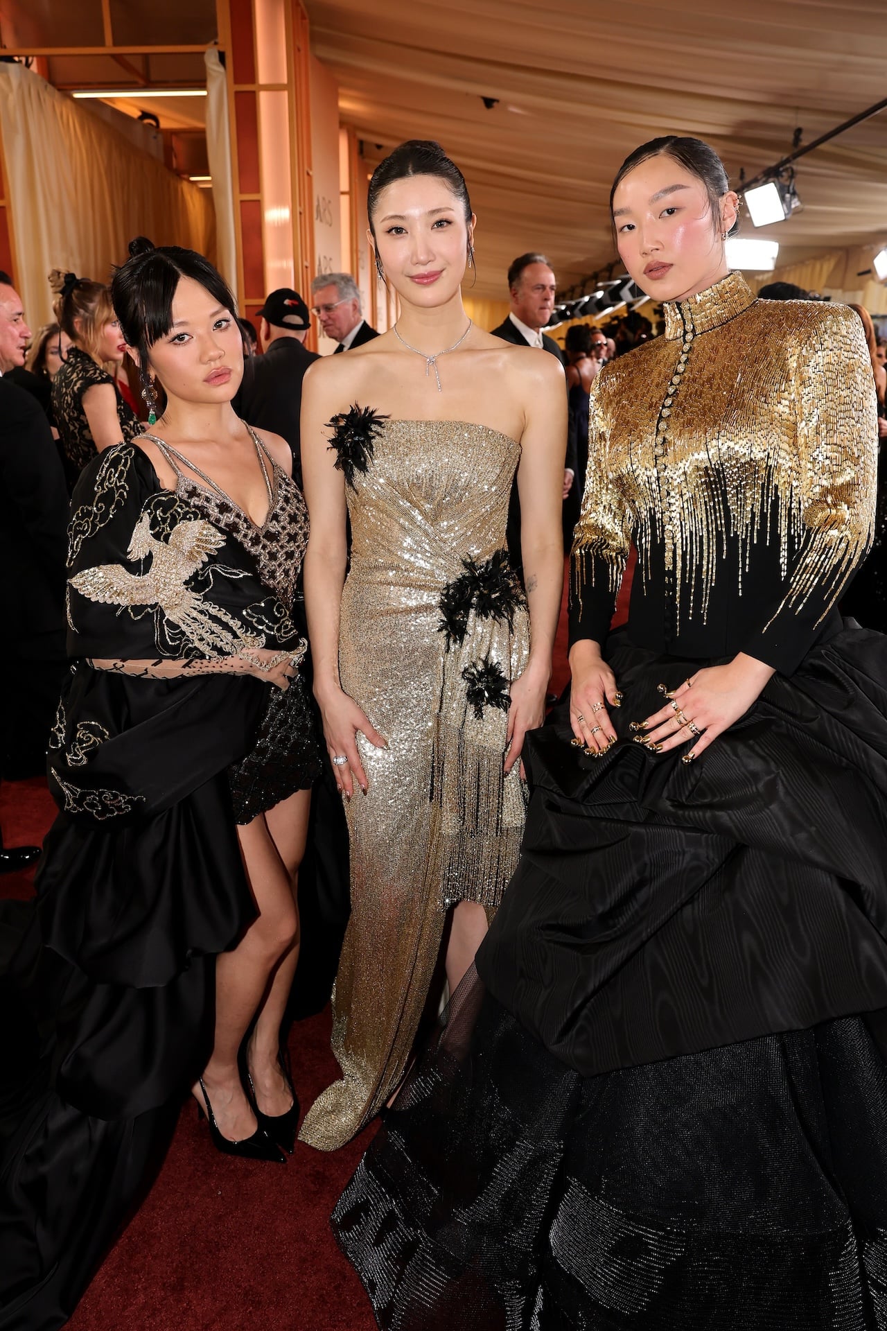 HOLLYWOOD, CALIFORNIA - MARCH 15: (L-R) Rei Ami, Ejae, and Audrey Nuna attend the 98th Oscars at Dolby Theatre on March 15, 2026 in Hollywood, California. (Photo by Emma McIntyre/Getty Images)