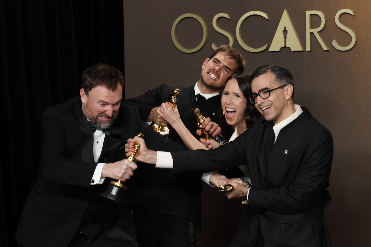 (L/R) After a tie in the category, US filmmakers Jack Piatt and Sam Davis hold the Oscar for best Best Live Action Short Film for "The Singers" alongside US filmmaker Alexandre Singh and US curator Natalie Musteata with their Oscar for best Best Live Action Short Film for "Two People Exchanging Saliva" in the press room during the 98th Annual Academy Awards at the Dolby Theatre in Hollywood, California on March 15, 2026. (Photo by VALERIE MACON / AFP)