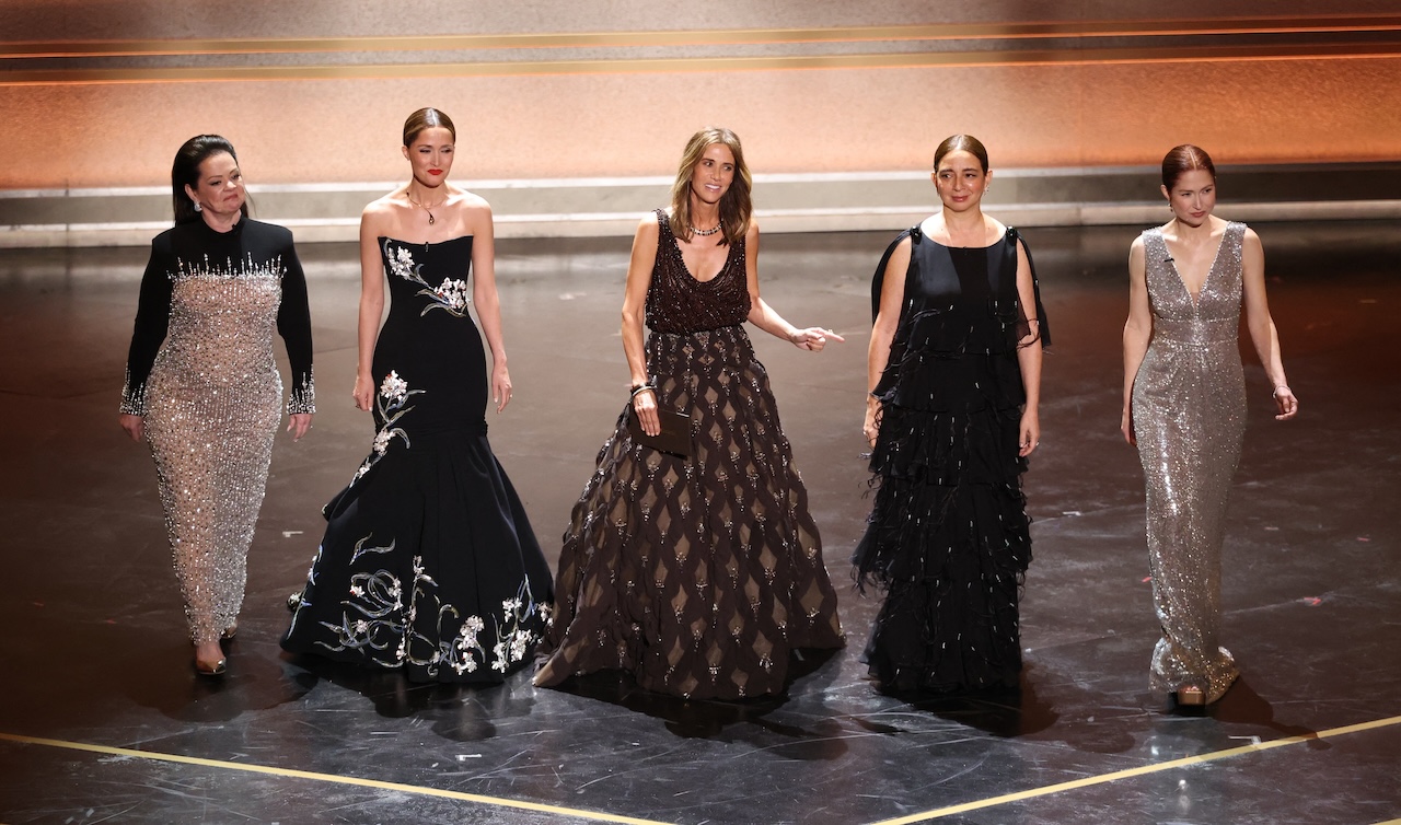 (L/R) US actress Melissa Mccarthy, Australian actress Rose Byrne, US actress Kristen Wiig, US actress Maya Rudolph and US actress Ellie Kemper arrive onstage to present the award for Best Music (Original Score) during the 98th Annual Academy Awards at the Dolby Theatre in Hollywood, California on March 15, 2026. (Photo by Patrick T. Fallon / AFP)