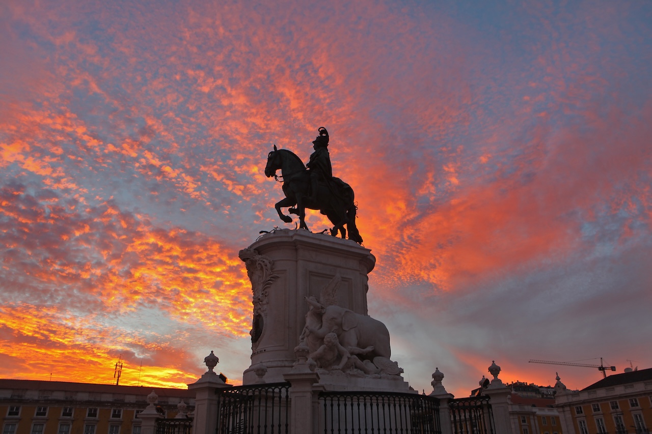 LISBON, PORTUGAL - OCTOBER 1: An equestrian statue of King José I dominates the center of the the Praça do Comércio, the popular riverfront square in the heart of the historic city at sunset on October 1, 2016 in Lisbon, Portugal. On 1 November 1755, during the reign of the Portuguese monarch, a great earthquake followed by a tsunami and fire destroyed most of Lisbon. The square, which was built on the ruins of the Ribeira Palace, was part of the efforts to restore the city after the disaster. (Photo by David Silverman/Getty Images)