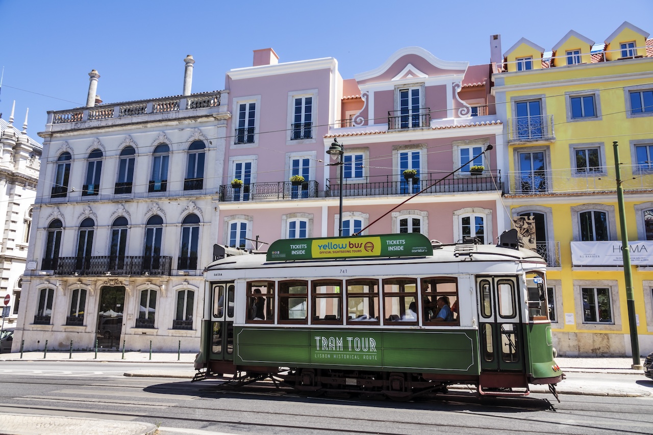 Portugal, Lisbon, Bairro Alto, Praca do Principe Real, vintage trolley tram in historic district. (Photo by: Jeffrey Greenberg/Universal Images Group via Getty Images)