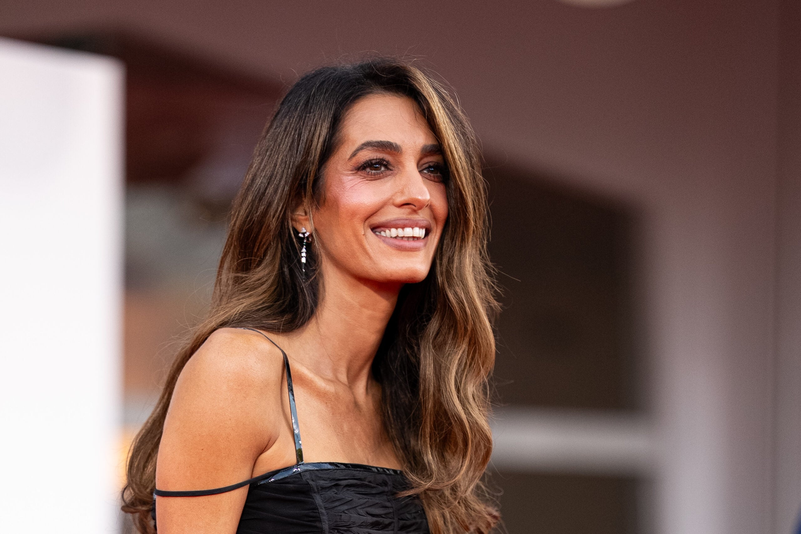 VENICE, ITALY - SEPTEMBER 02: Amal Clooney attends the "Ink" screening and opening ceremony of the 83rd Venice International Film Festival at Sala Grande on September 02, 2026 in Venice, Italy. (Photo by Alessandro Levati/Getty Images)