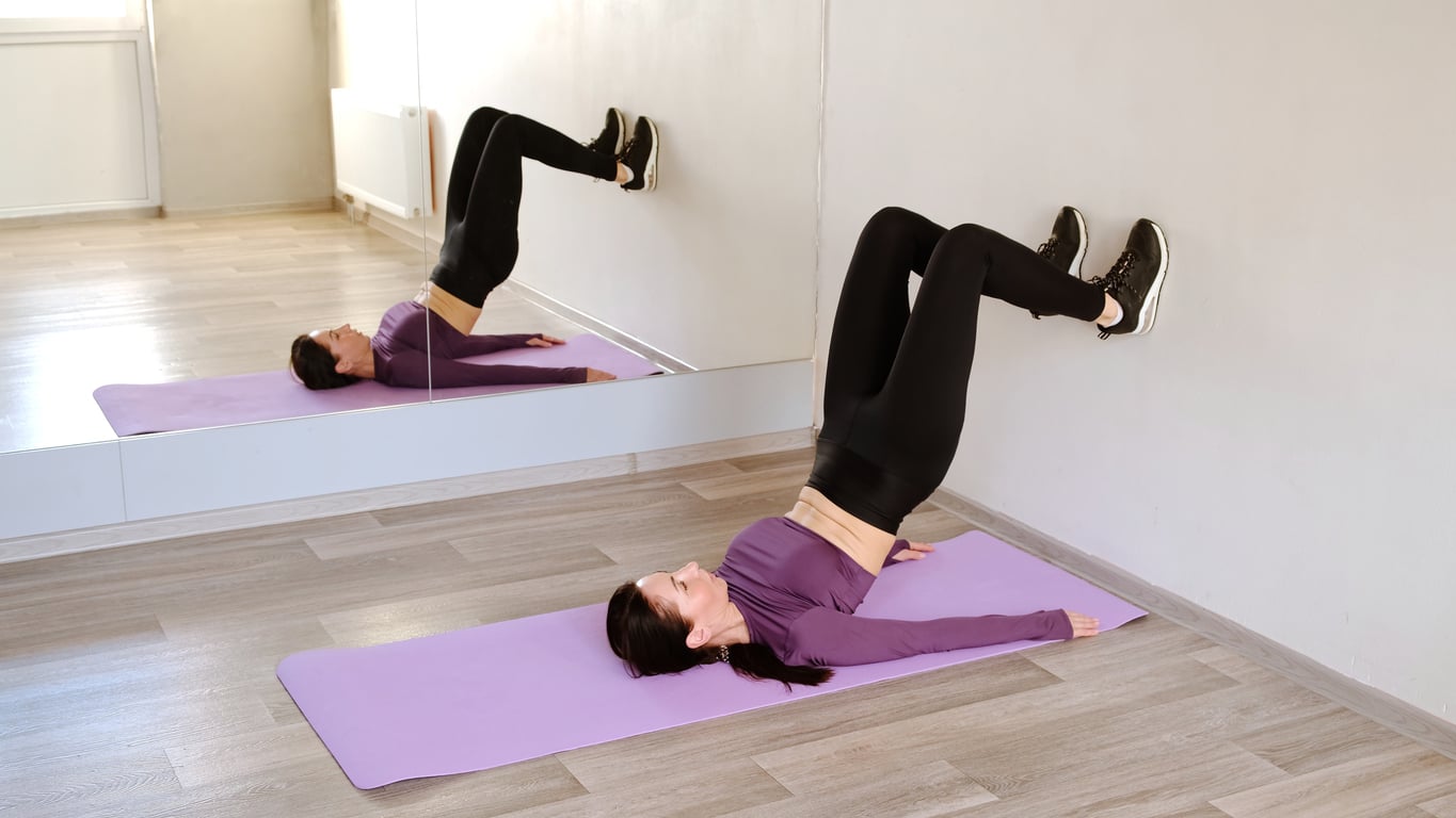 These 4 Wall Pilate Exercises Work the Muscles You Never Feel