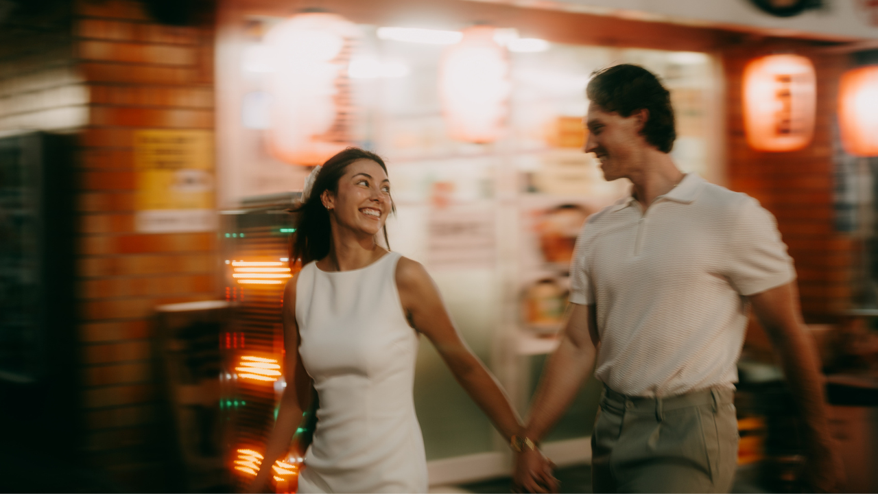 A couple holding hands