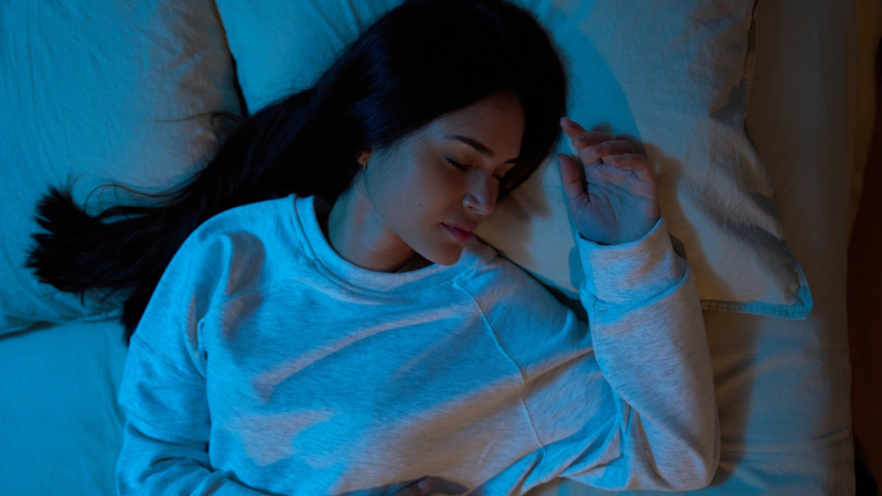 Woman asleep in bed