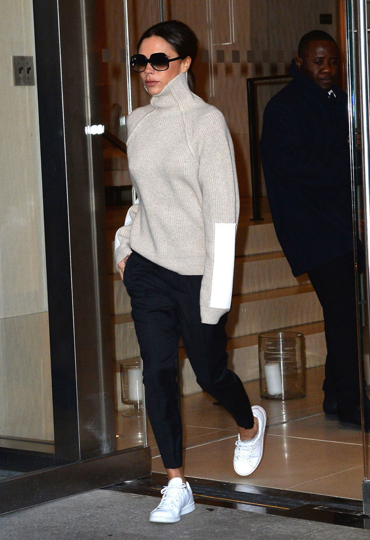 We finally know why Victoria Beckham has fallen in love with white trainers