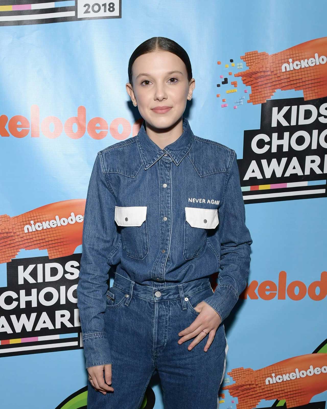 In double denim, Millie Bobby Brown supports March For Our Lives