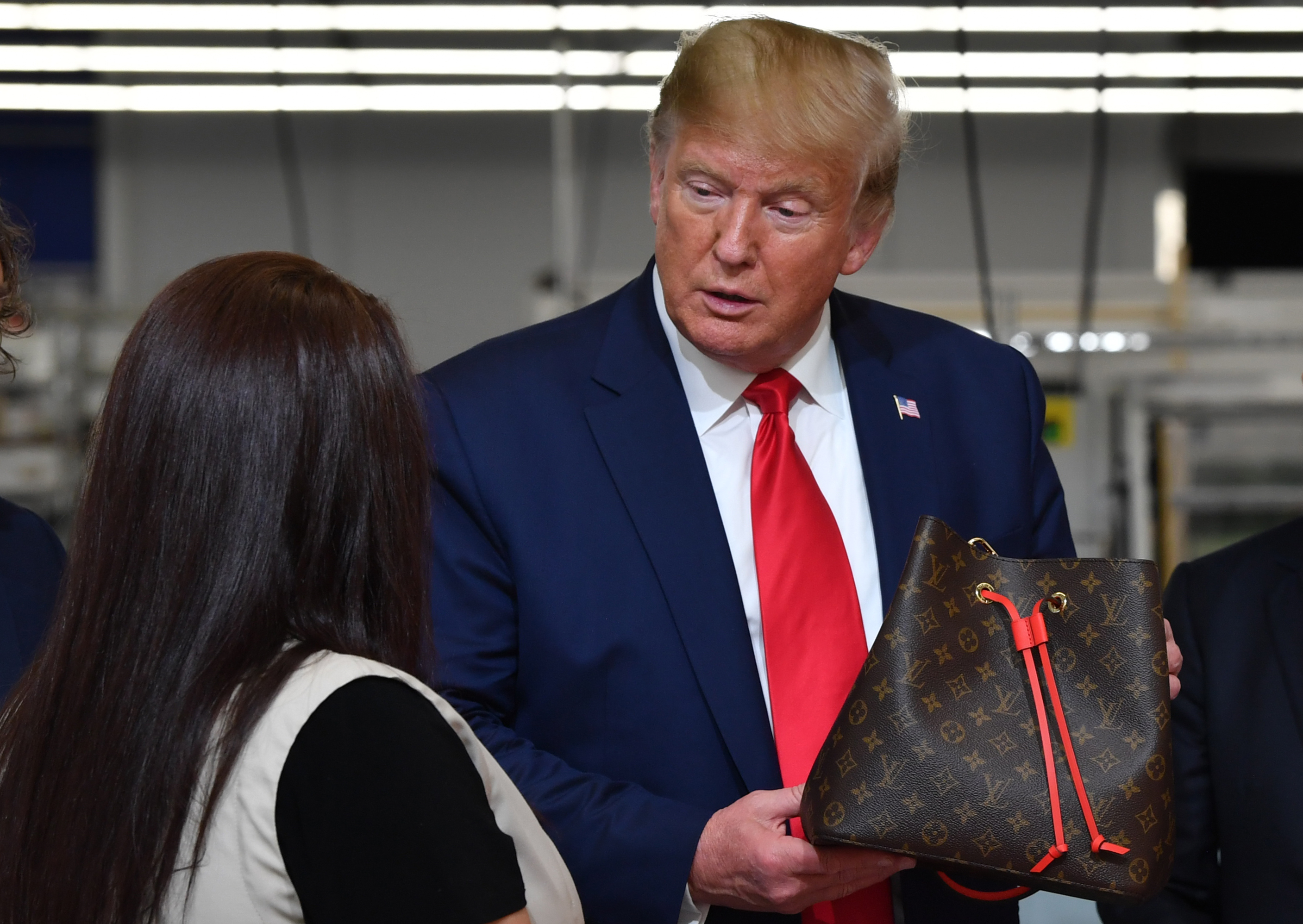 President Donald Trump visits Louis Vuitton factory in Texas before  campaign rally