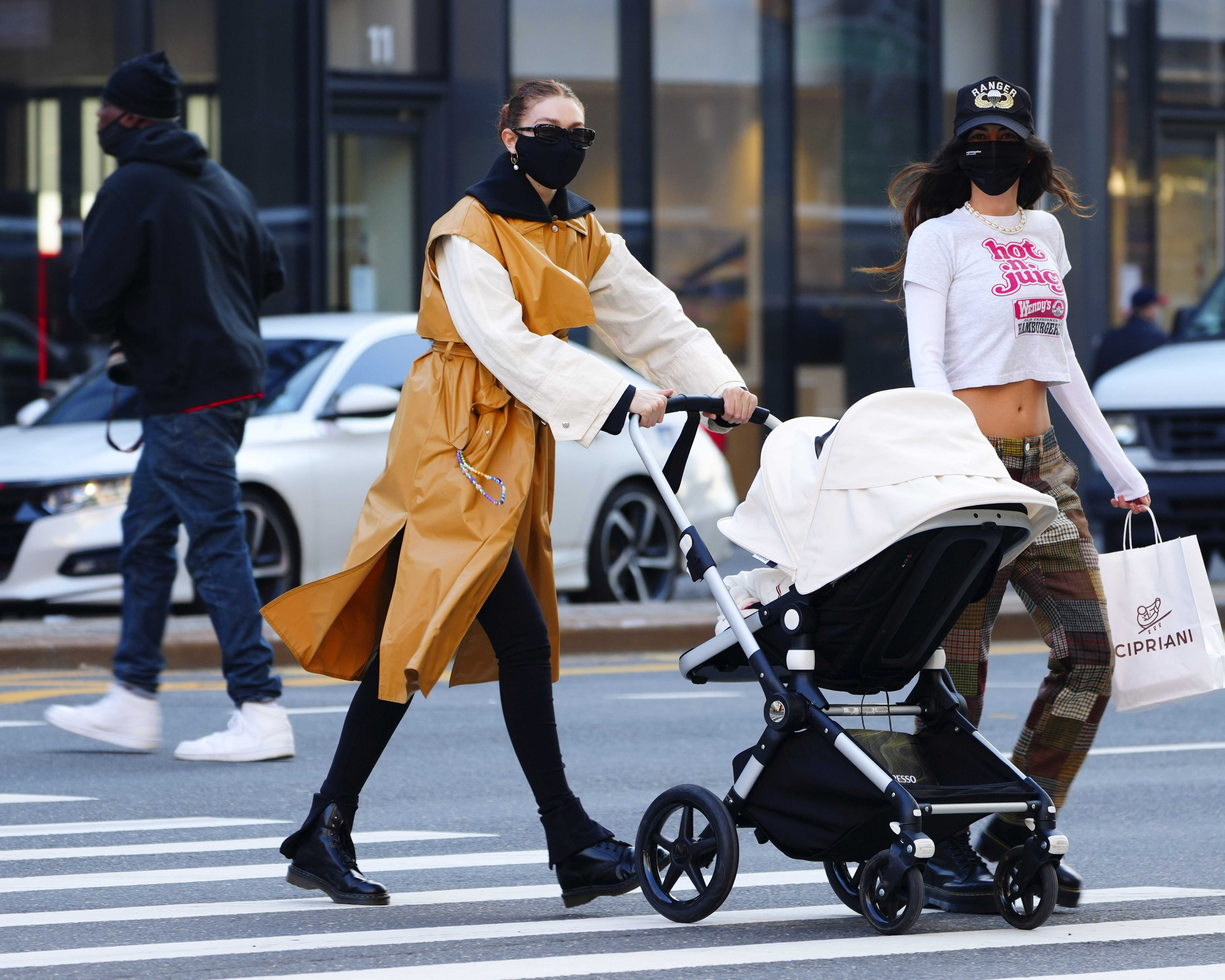 Gigi Hadid & Zayn Malik Debut Couple Style on Walk With Daughter Khai –  Footwear News