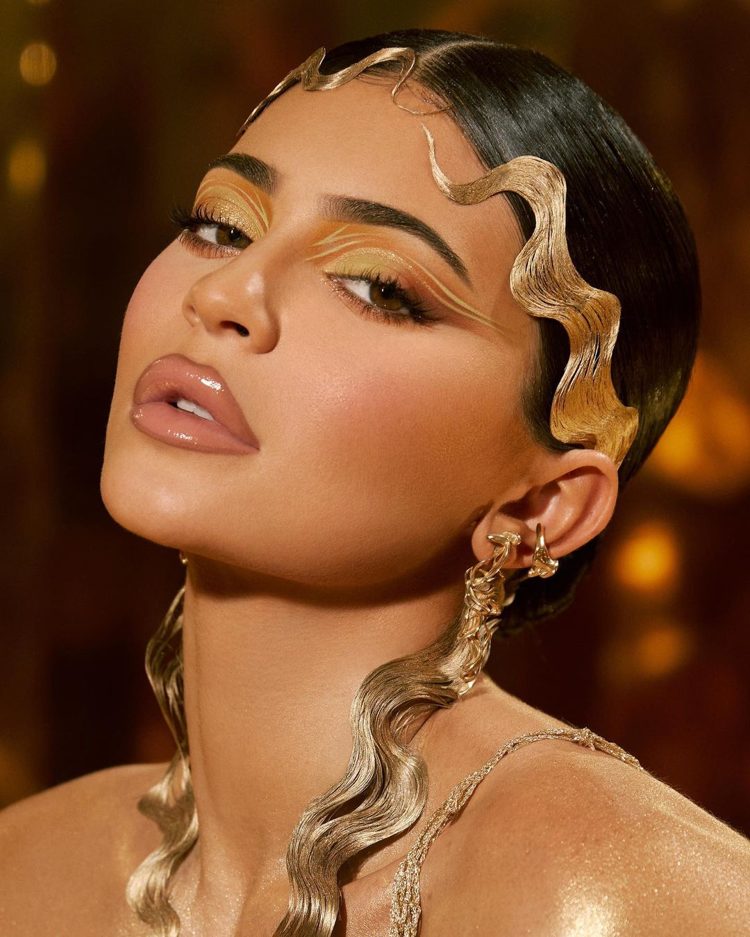 Kylie Jenner's Birthday Collection Beauty Look Is Glossy, Gilded Perfection