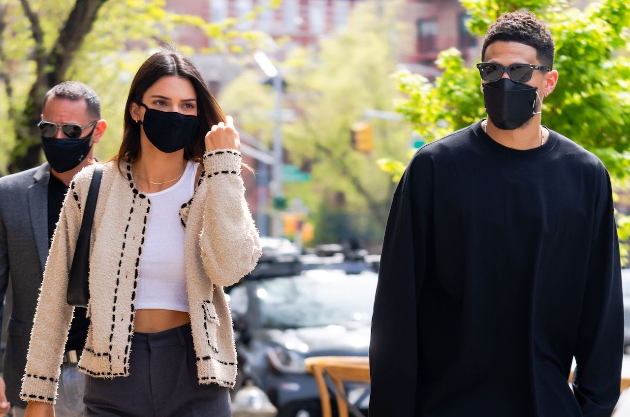 Kendall Jenner in white crop top and green skirt in Italy on