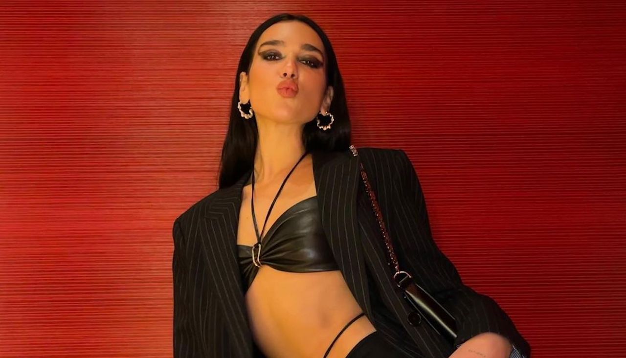 Dua Lipa S Version Of A Suit Dion Lee Front Cut Out Pants A Leather Bra And A Pinstripe Blazer To Boot
