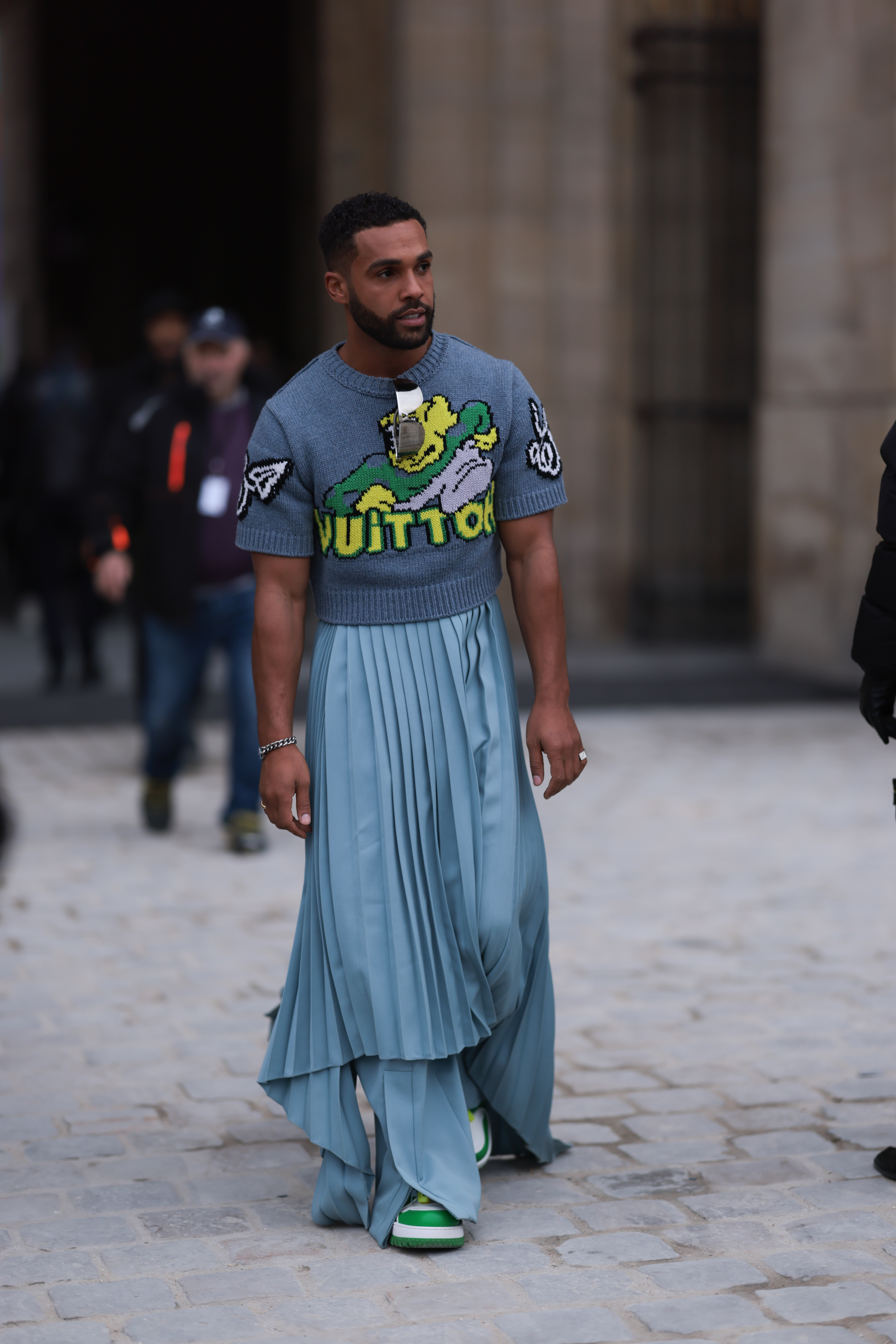 A guest is seen on the street attending LOUIS VUITTON during Paris