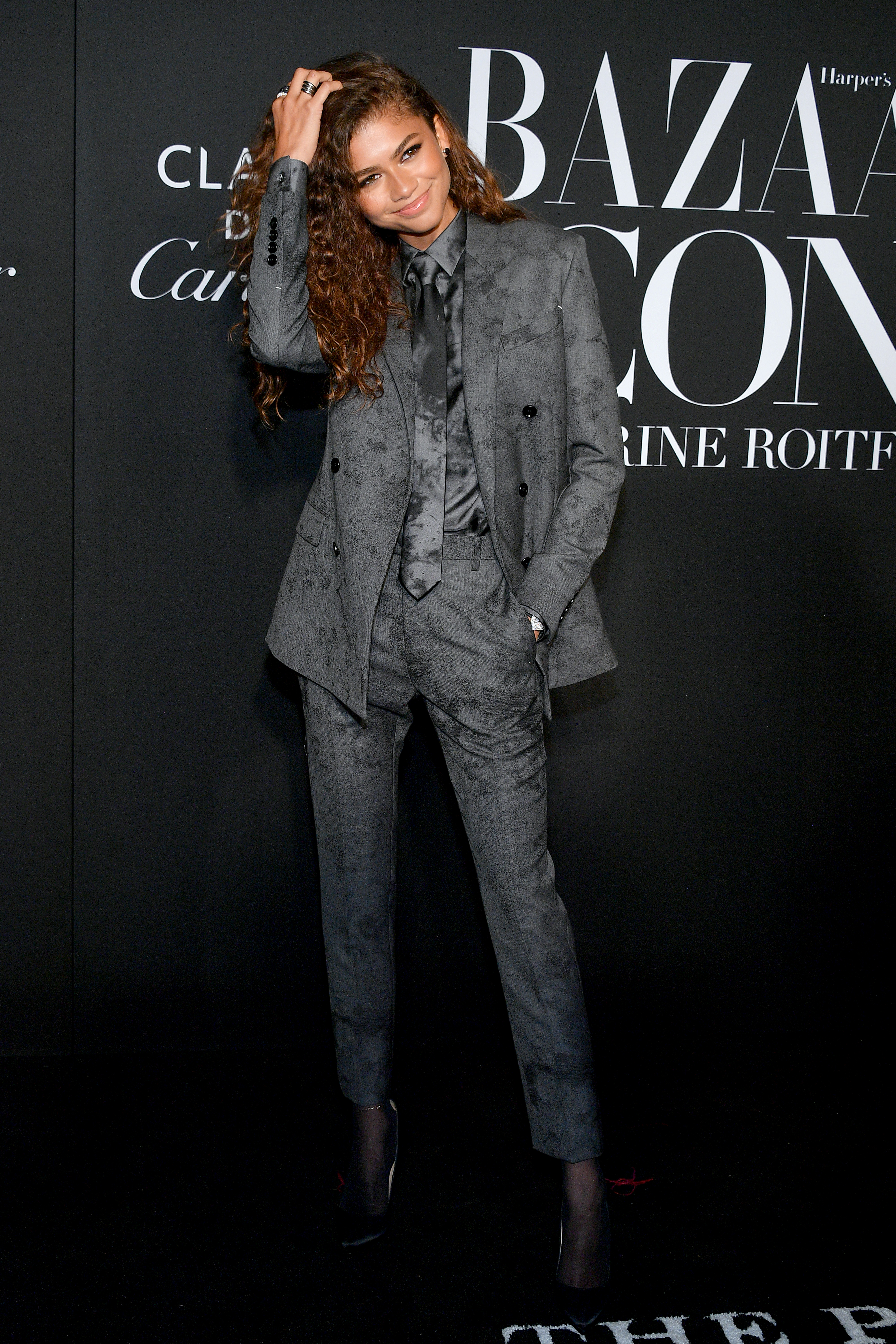 Zendaya Wears Backless Plunge Vest at CinemaCon