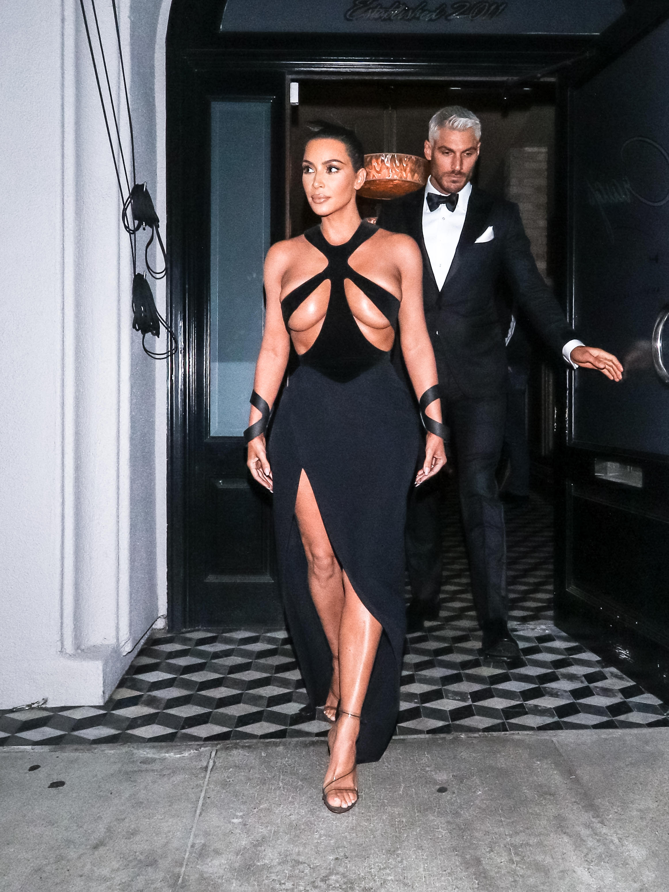 Kim Kardashian Let Paris Peek Right Through Her Swiss-Cheese Dress | Glamour