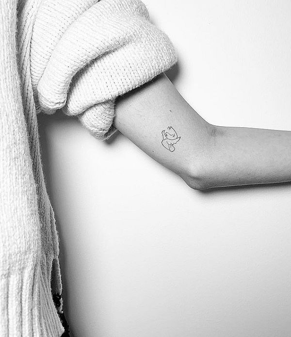 Kaia Gerber debuts two new line tattoos with brother Presley