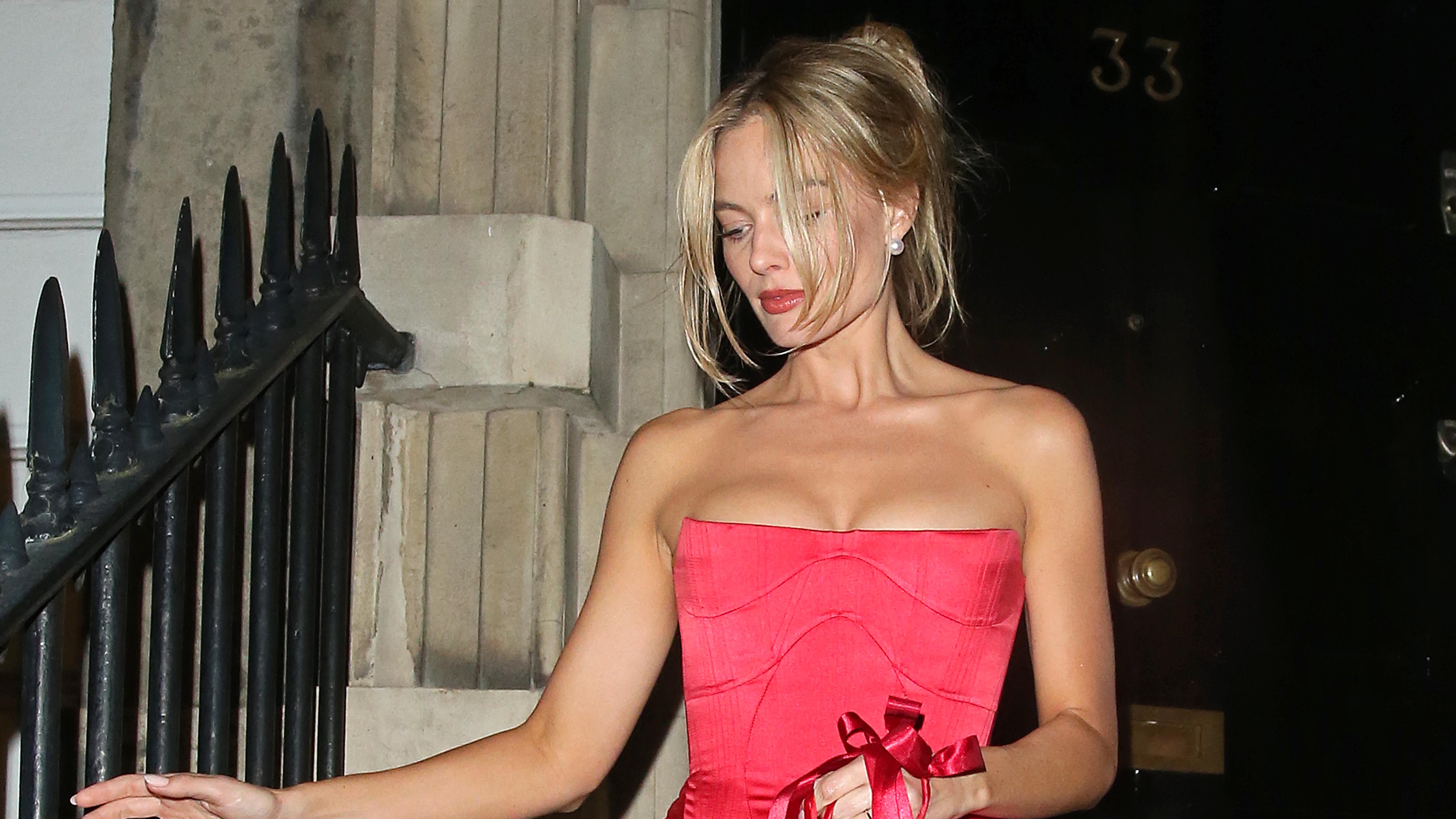 Margot Robbie sizzles in red afterparty minidress after 'Barbie' UK premiere