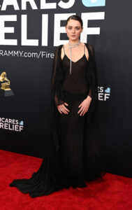 The Grammys red carpet has always been a dazzling showcase of fashion, where music’s biggest names take bold sartorial risks and deliver unforgettable style moments. From J.Lo’s plunging Versace gown to Cardi B’s archival Mugler masterpiece, history has proven that this is the night to go big or go home. As the 67th annual ceremony unfolded at Los Angeles’ Crypto Arena, the 2025 red carpet proved no exception, serving up a spectacle of high glamour and boundary-pushing design. Leading the night with a record-breaking 99 career nominations, Beyoncé set the tone for an evening of star-studded excellence. Hot on her heels, Billie Eilish, Post Malone, Kendrick Lamar, and Charli XCX each earned seven nods, while Taylor Swift, securing her seventh Album of the Year nomination, continued to make history. Rising stars Sabrina Carpenter and Chappell Roan marked their first Grammy appearances with statement-making style, cementing their status as ones to watch. With 94 golden gramophones up for grabs, the night was a celebration of musical brilliance—but before any awards were handed out, the red carpet set the stage. From custom couture to vintage treasures, these were the most memorable looks from the 2025 Grammys.